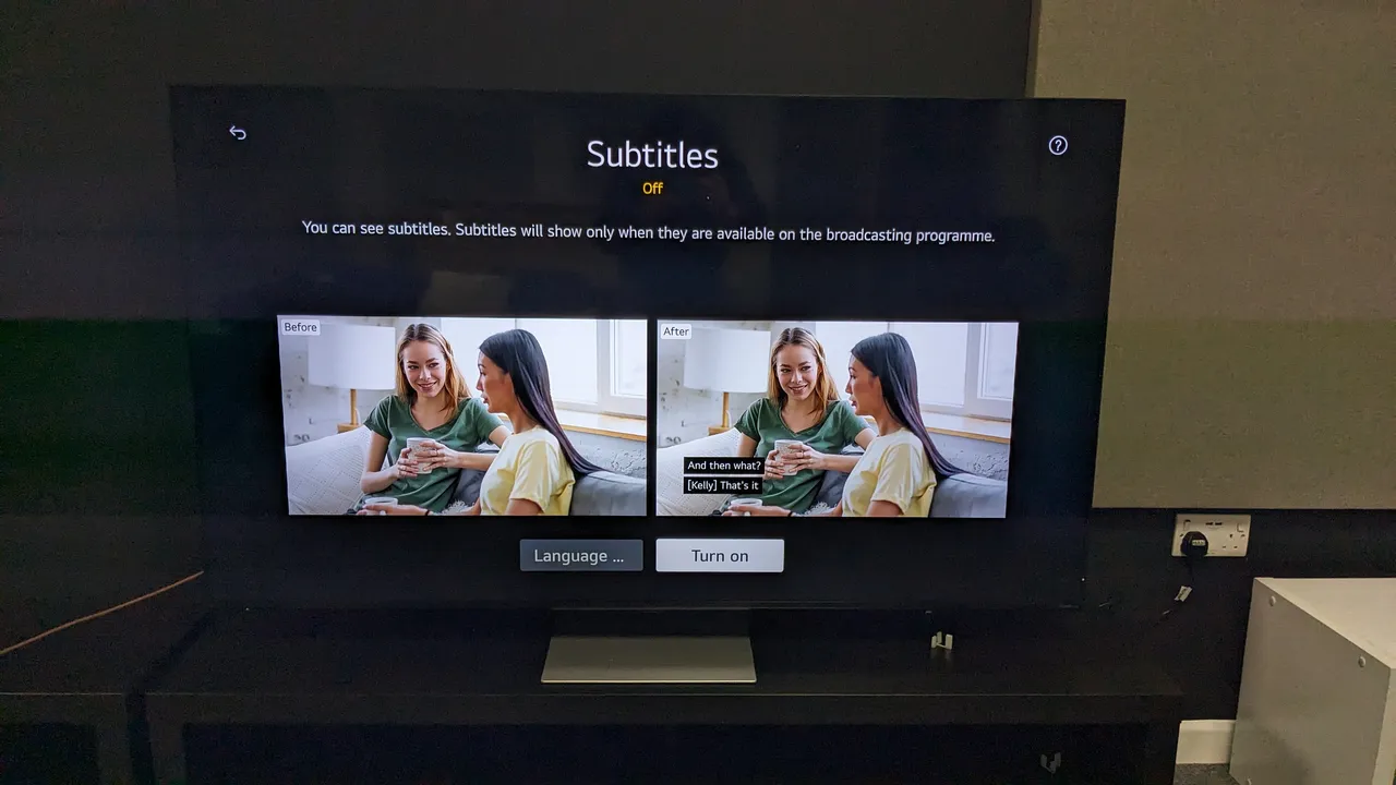 A television showing a subtitles settings screen with before-and-after examples of subtitles over a scene